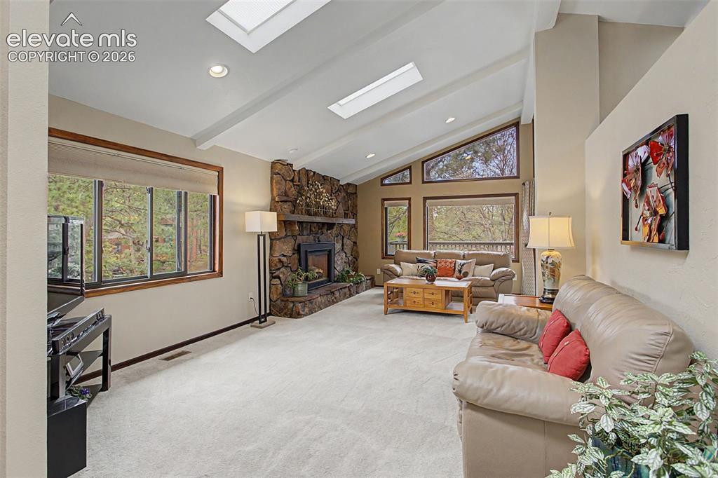 Image 9 of 49: Plenty of light from 6 Skylights in living areas