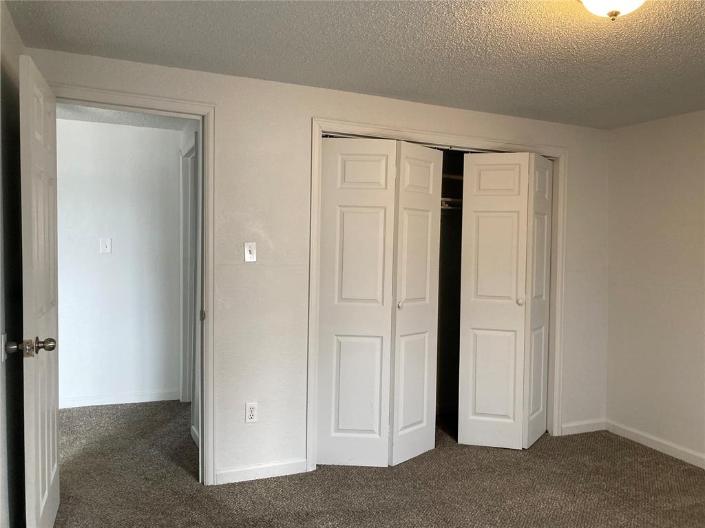 Image 10 of 10: Rear bedroom closet