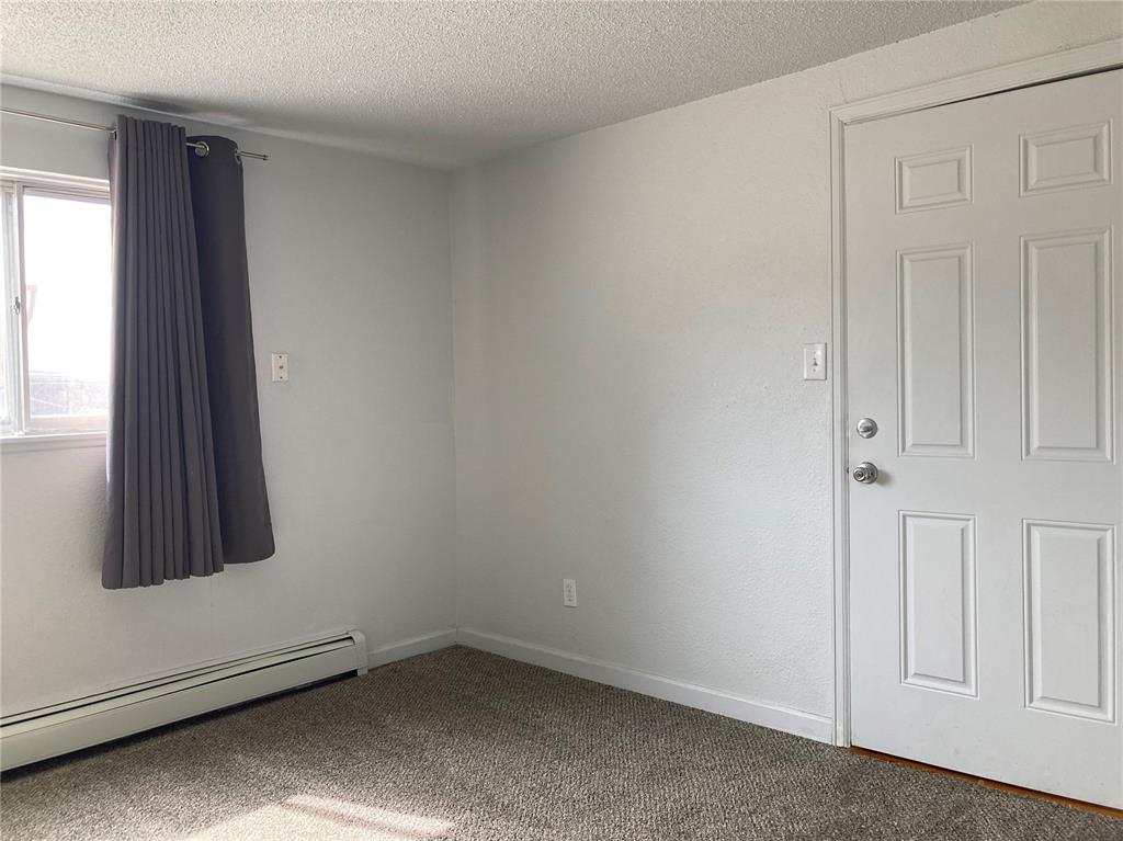 Image 2 of 10: Entry and Living room