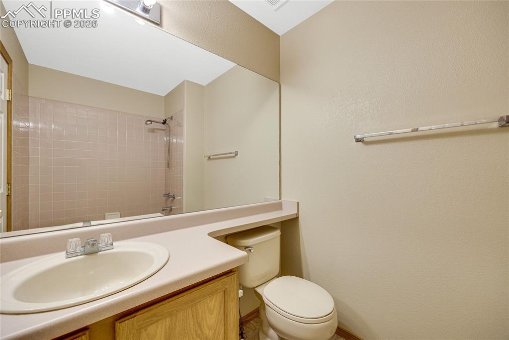 Image 20 of 32: Full bathroom featuring vanity and bathtub / shower combination