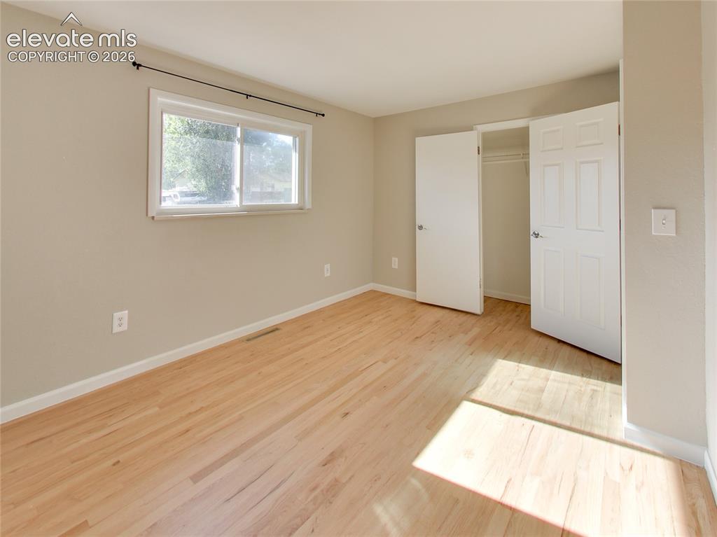 Image 19 of 32: 2nd main level bedroom