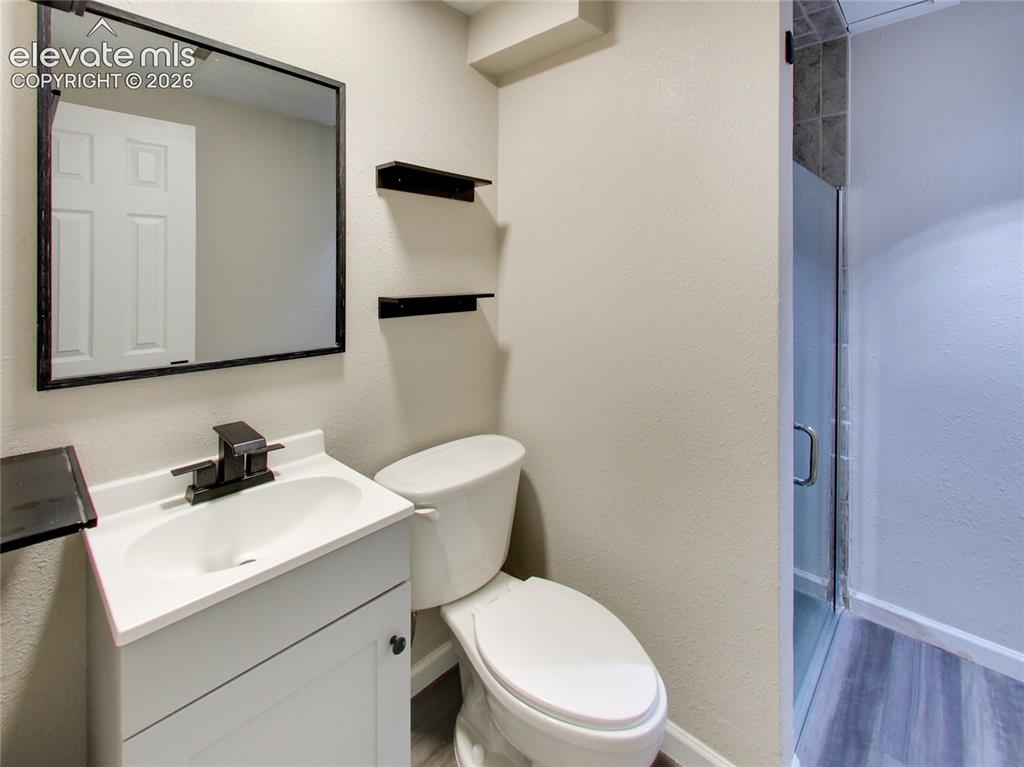 Image 23 of 32: basement bathroom