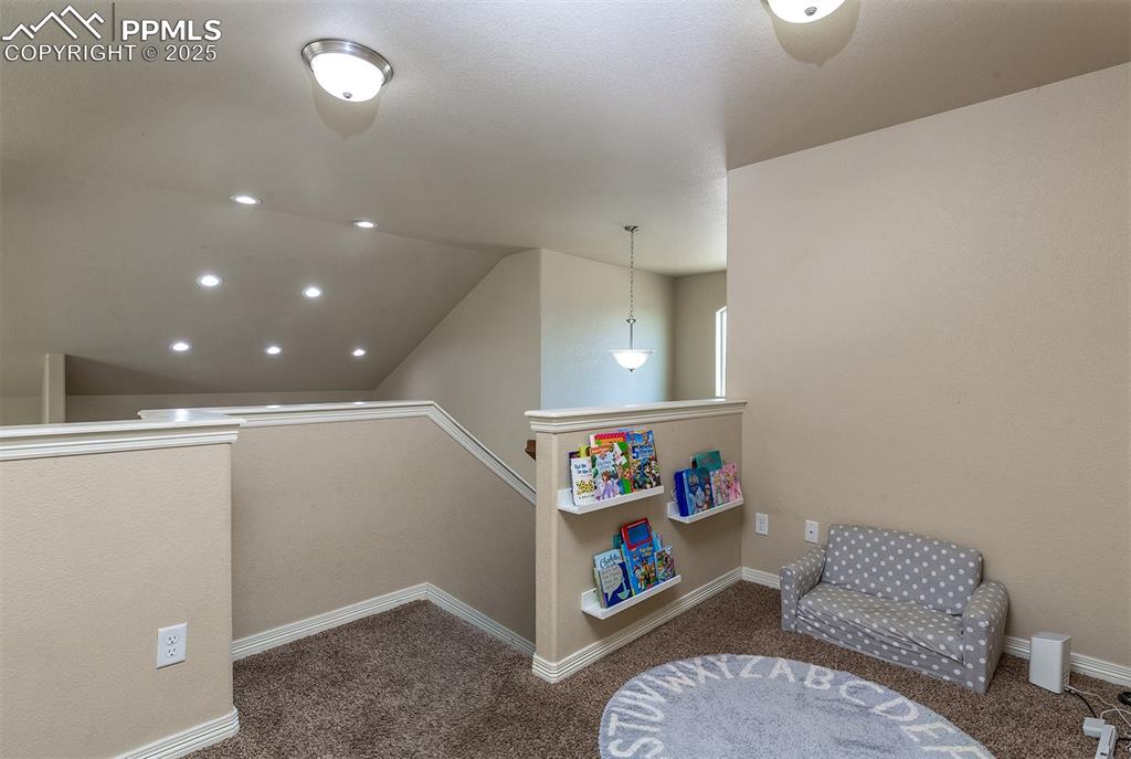 Image 19 of 33: Playroom featuring carpet, vaulted ceiling, and recessed lighting