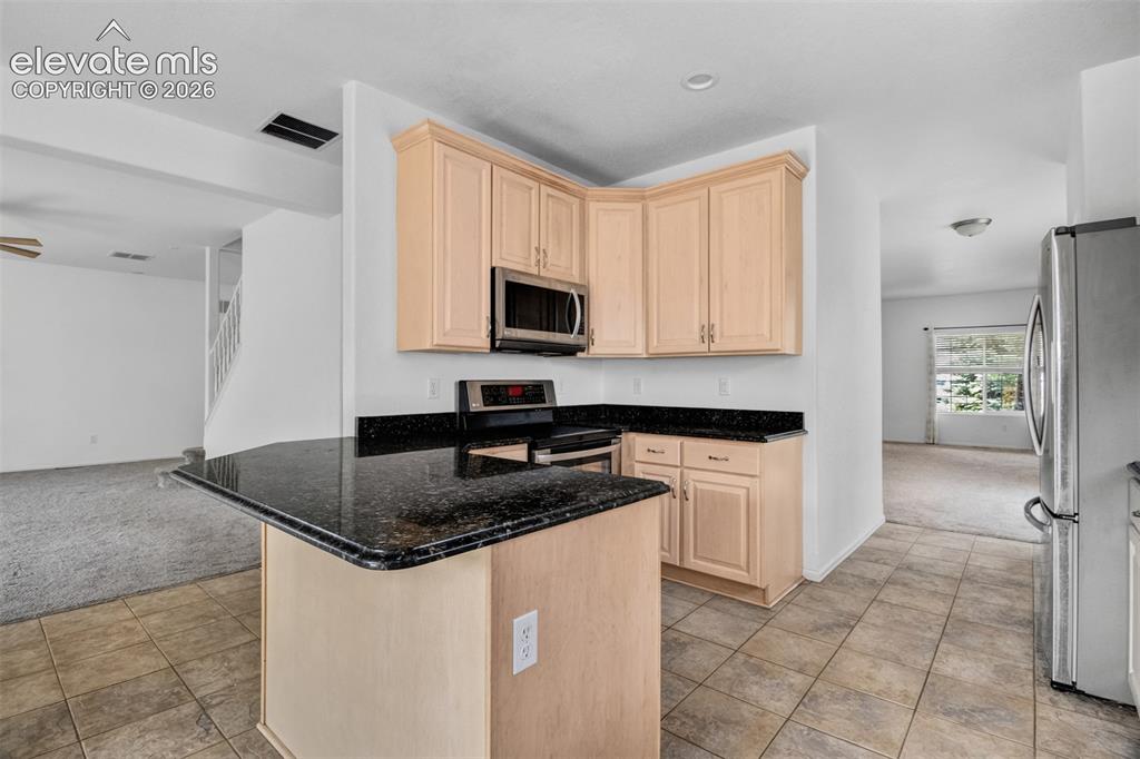 Image 4 of 16: Kitchen