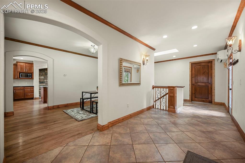Image 13 of 43: Hallway and dining area