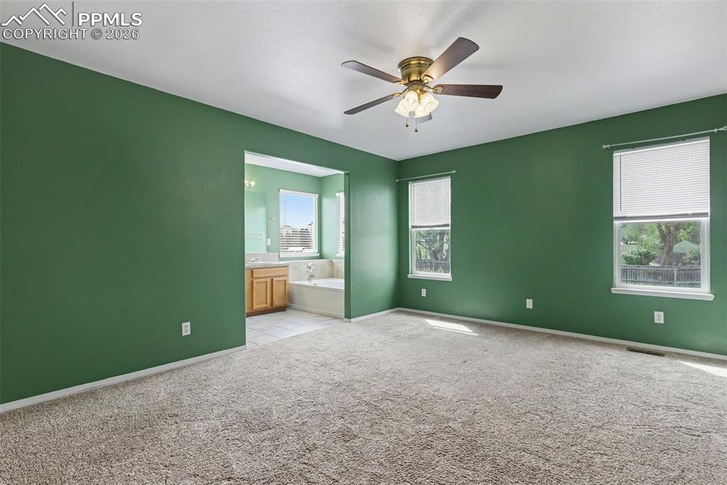 Image 14 of 30: Primary Bedroom