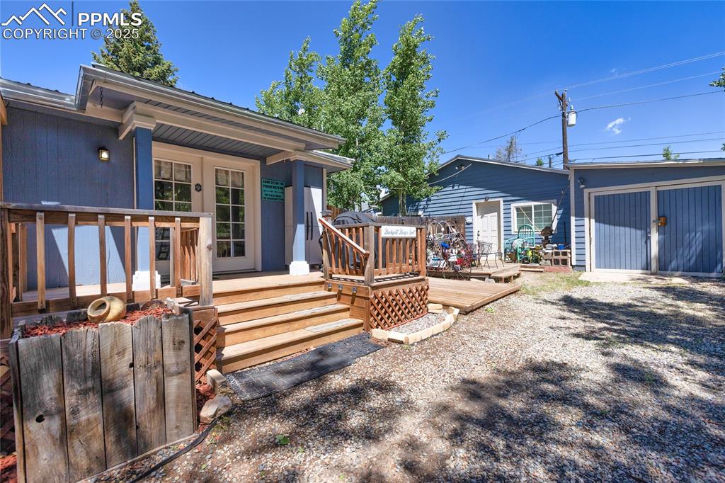 Image 17 of 20: side entry plus rear 1600 sq ft workshop/garage