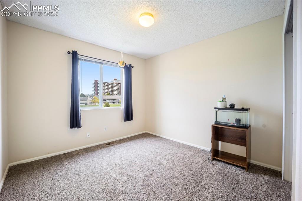 Image 19 of 33: Bedroom