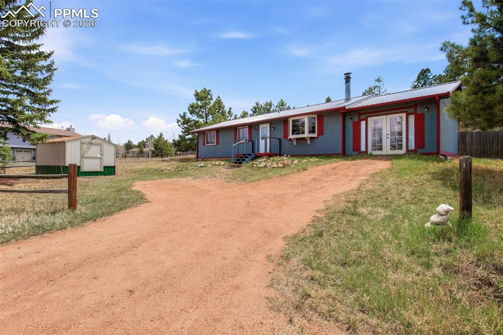 Image 1 of 31: Front of this lovely mountain ranch-style home