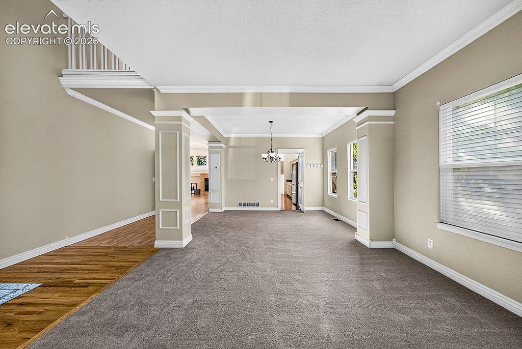 Image 5 of 50: Enter to the formal living/dining rooms.