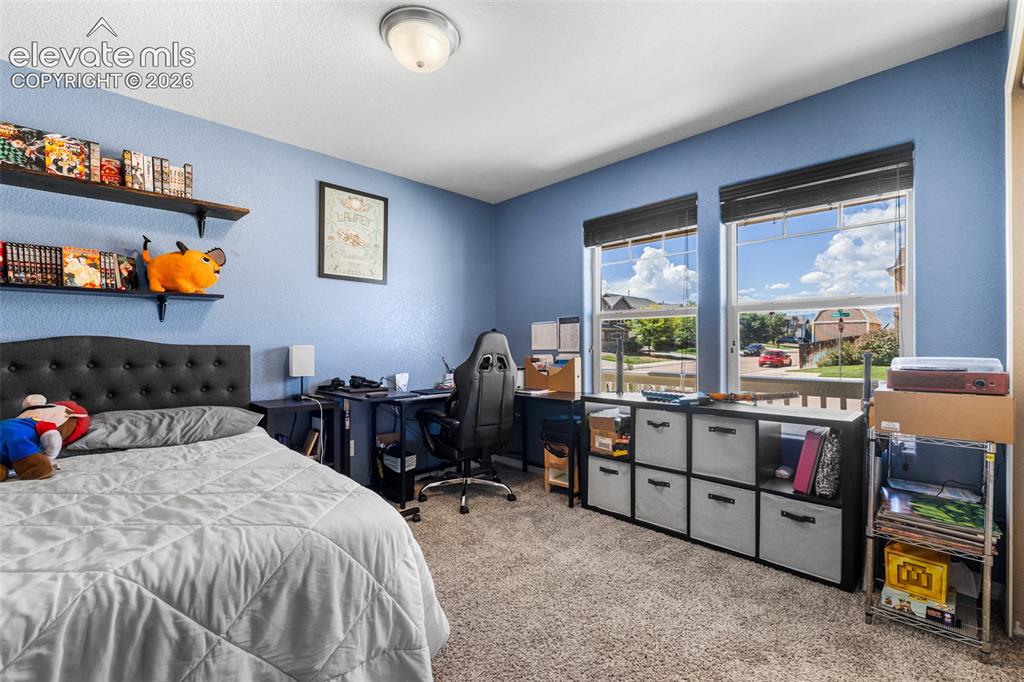 Image 18 of 47: main level bedroom