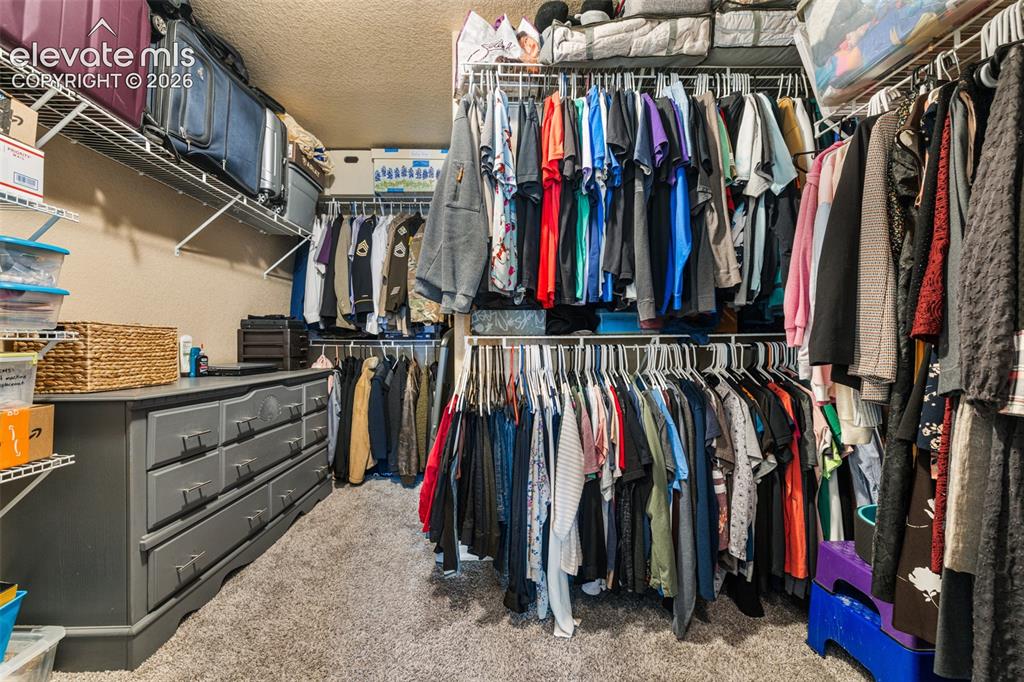 Image 30 of 47: Huge Primary Closet