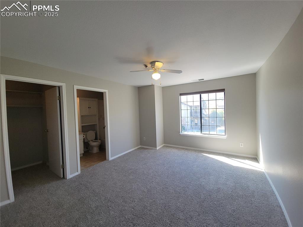 Image 10 of 19: Master Bedroom and walk-in closet