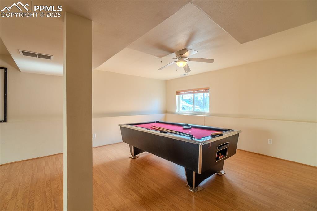 Image 20 of 36: Rec room featuring billiards table, light wood finished floors, and ceiling