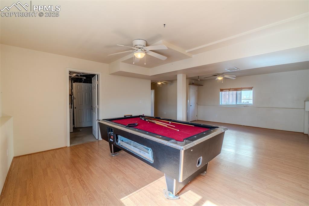 Image 22 of 36: Rec room featuring billiards table, light wood-style floors, and a ceiling