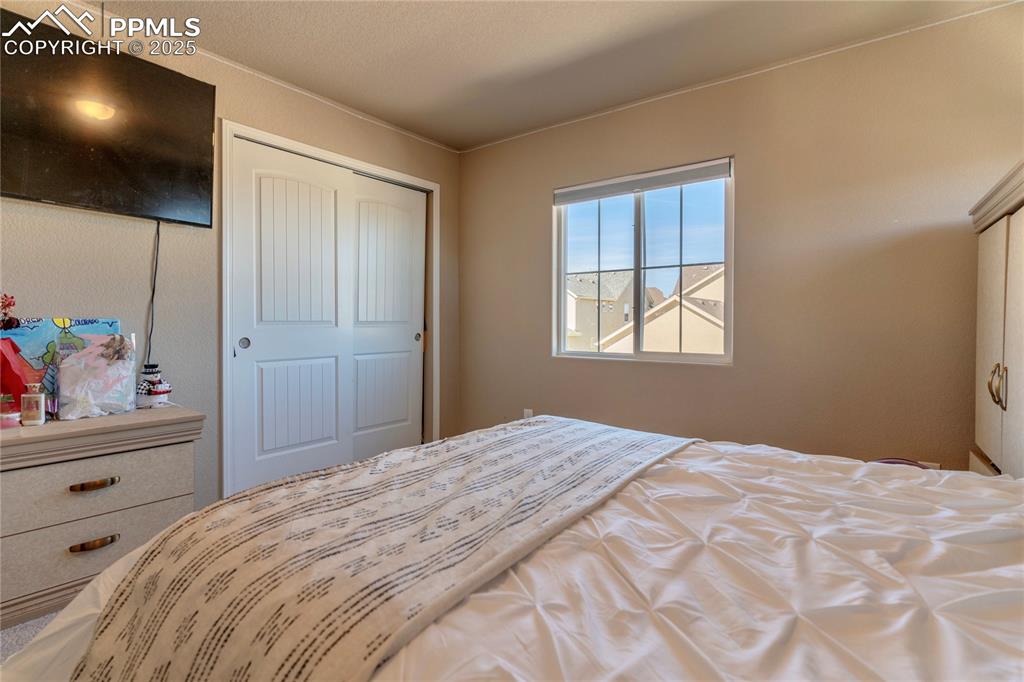 Image 22 of 30: Bedroom