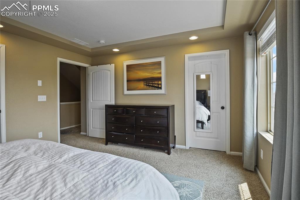Image 20 of 38: Bedroom featuring light carpet