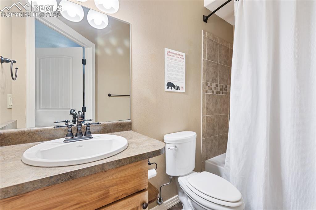 Image 26 of 31: There is also a full bathroom on the lower level which makes it easy for fa