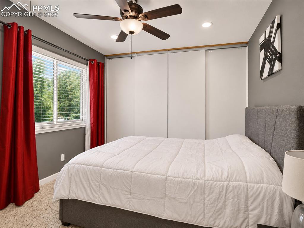 Image 10 of 22: Primary bedroom with en-suite bathroom