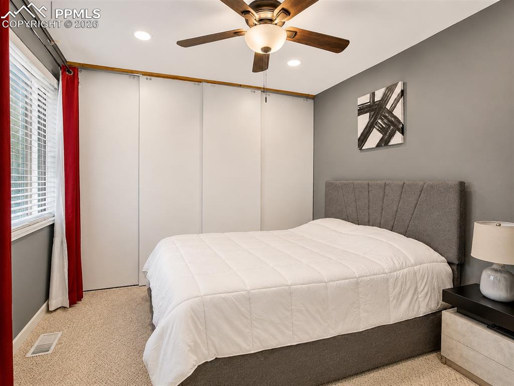 Image 11 of 22: Primary bedroom with en-suite bathroom