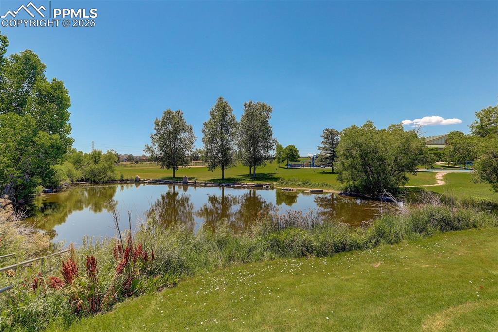 Image 16 of 22: favorite just one mile away, with open green spaces, walking paths, playgro