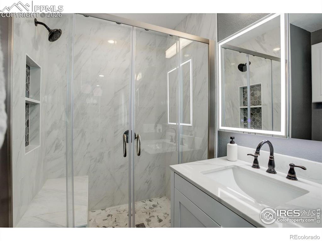 Image 3 of 22: "Step into the elegance of the newly designed primary en-suite bathroom, sh