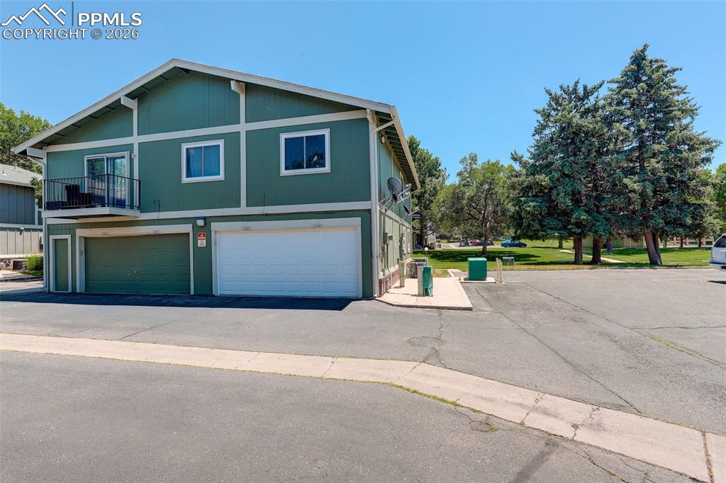 Image 5 of 22: One car shared attached garage.