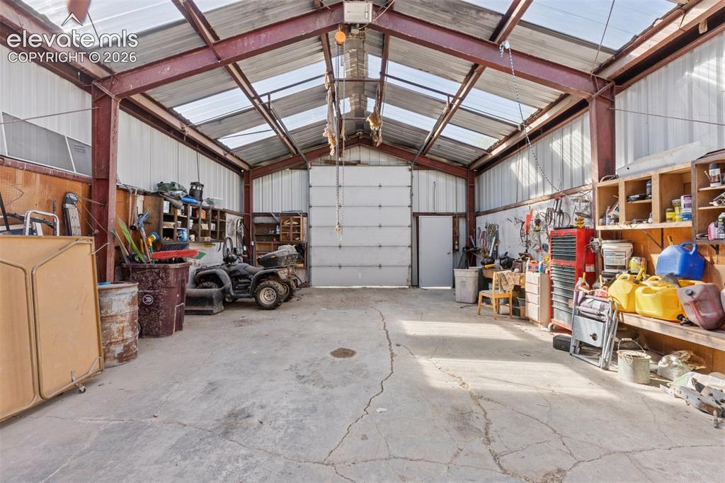 Image 24 of 50: Workshop Interior with Bay Door