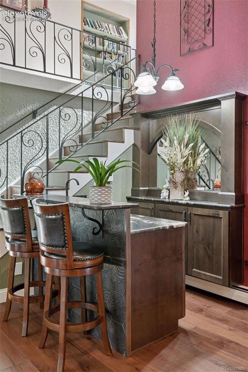 Image 28 of 50: Wet Bar in Family Room/Dining Room