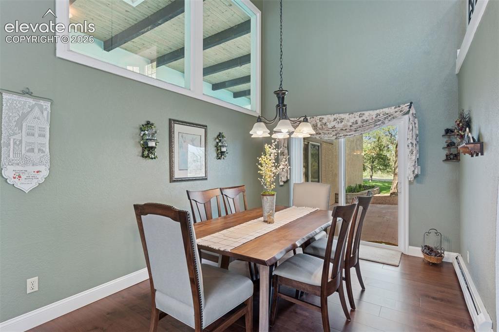 Image 30 of 50: Dining Area with Direct Access to Private Patio