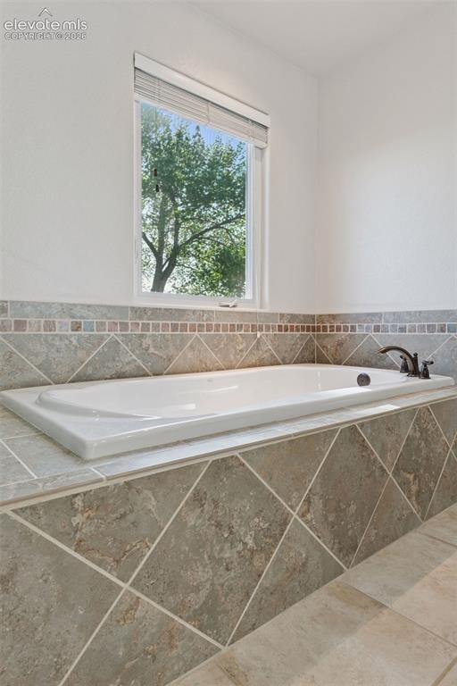 Image 41 of 50: Primary Bath with Large Soaking Tub