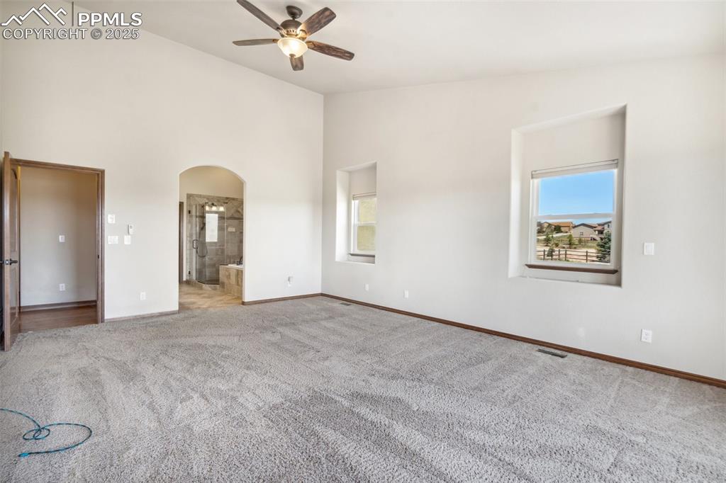 Image 19 of 50: Master Bedroom
