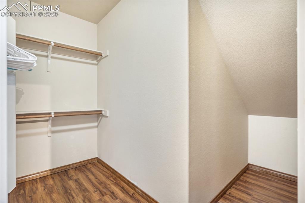 Image 37 of 50: Walk-in closet for bedroom #4.