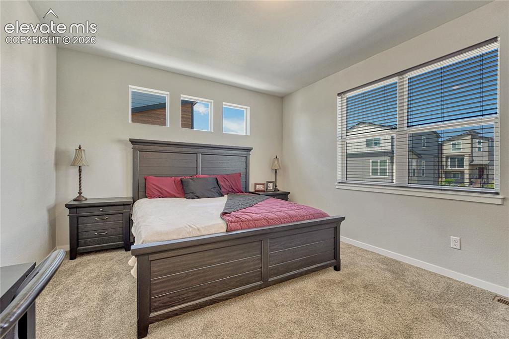 Image 17 of 30: Primary bedroom...