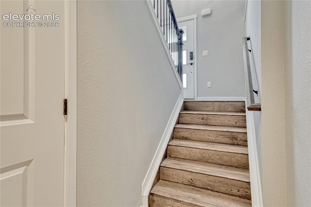 Image 23 of 30: Luxury vinyl flooring to lower level.