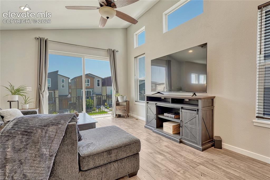 Image 9 of 30: Great room offers abundant natural light.
