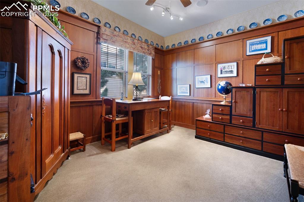 Image 14 of 41: Cherry paneled walls