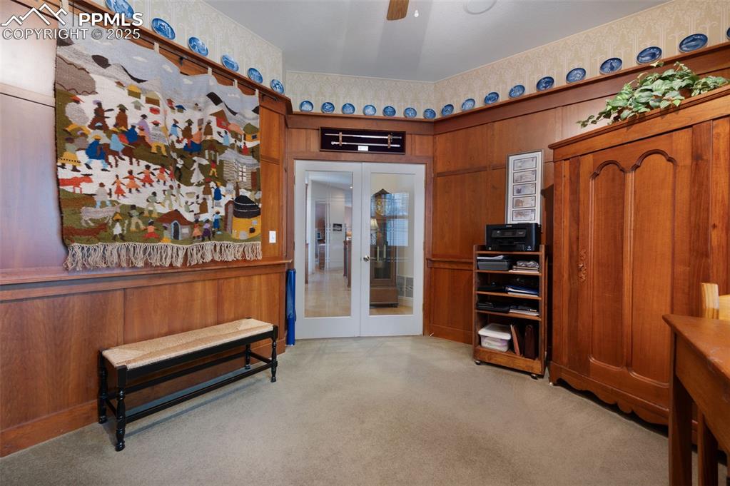 Image 15 of 41: French doors to main-level office/den