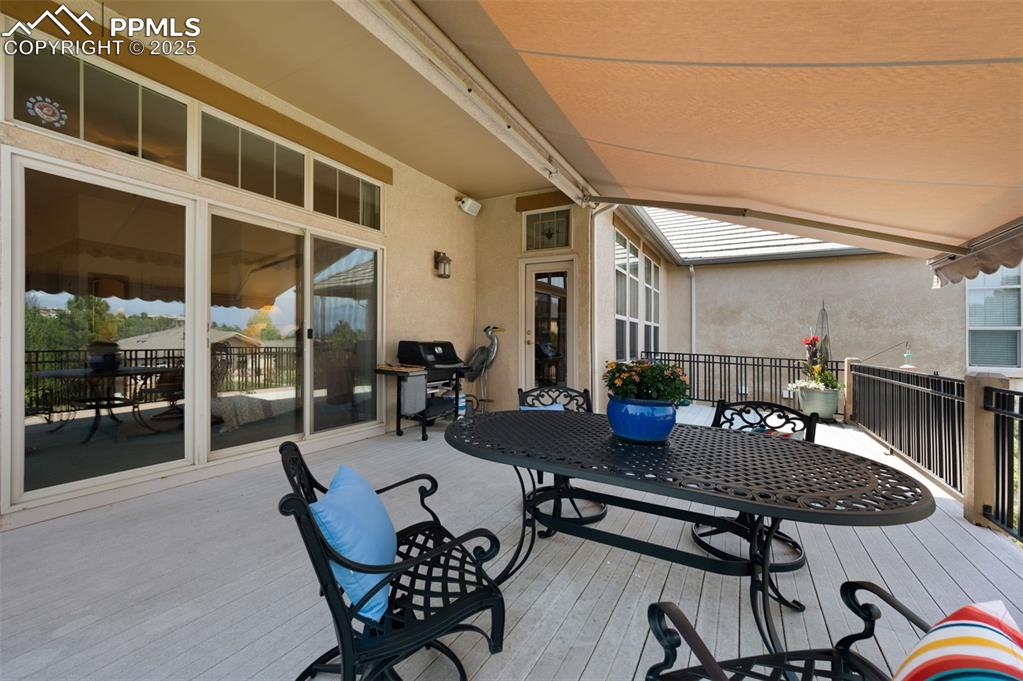 Image 4 of 41: Retractable awning for afternoon comfort