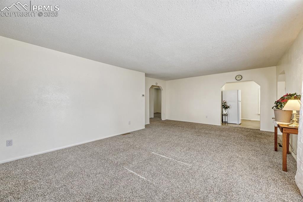 Image 8 of 30: Looking into kitchen