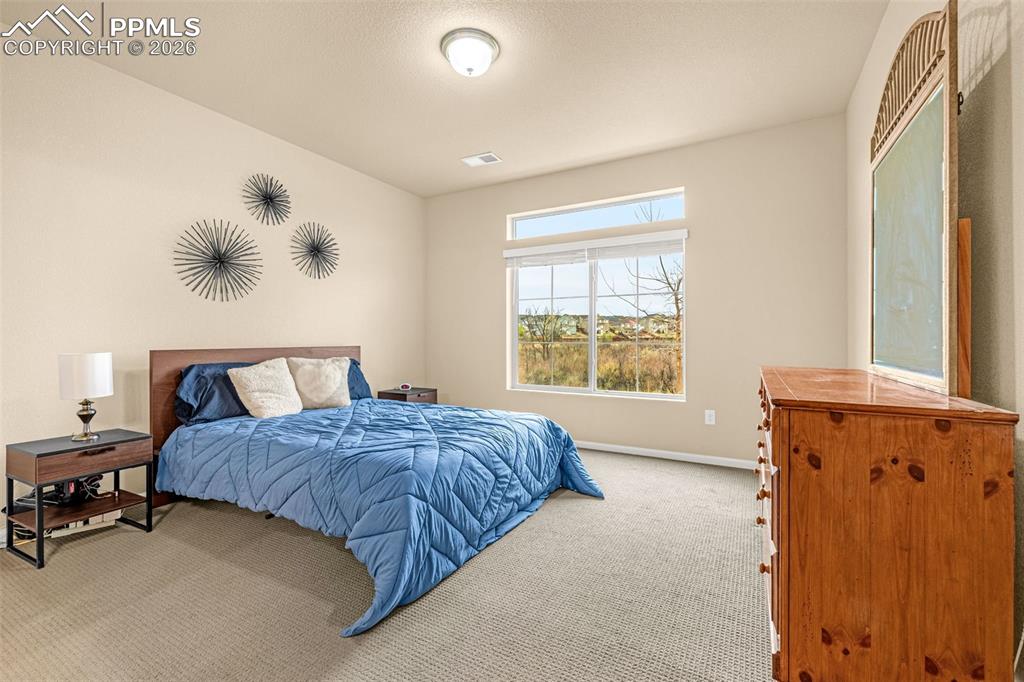 Image 11 of 38: Bedroom