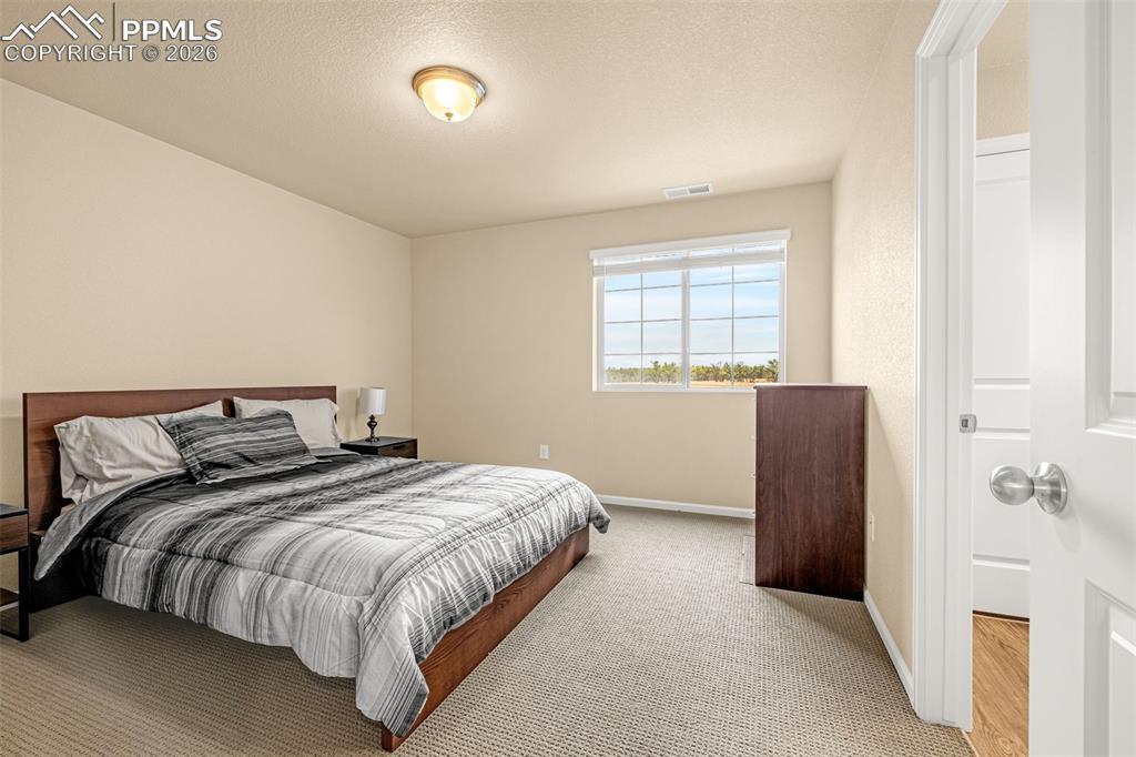 Image 21 of 38: Bedroom