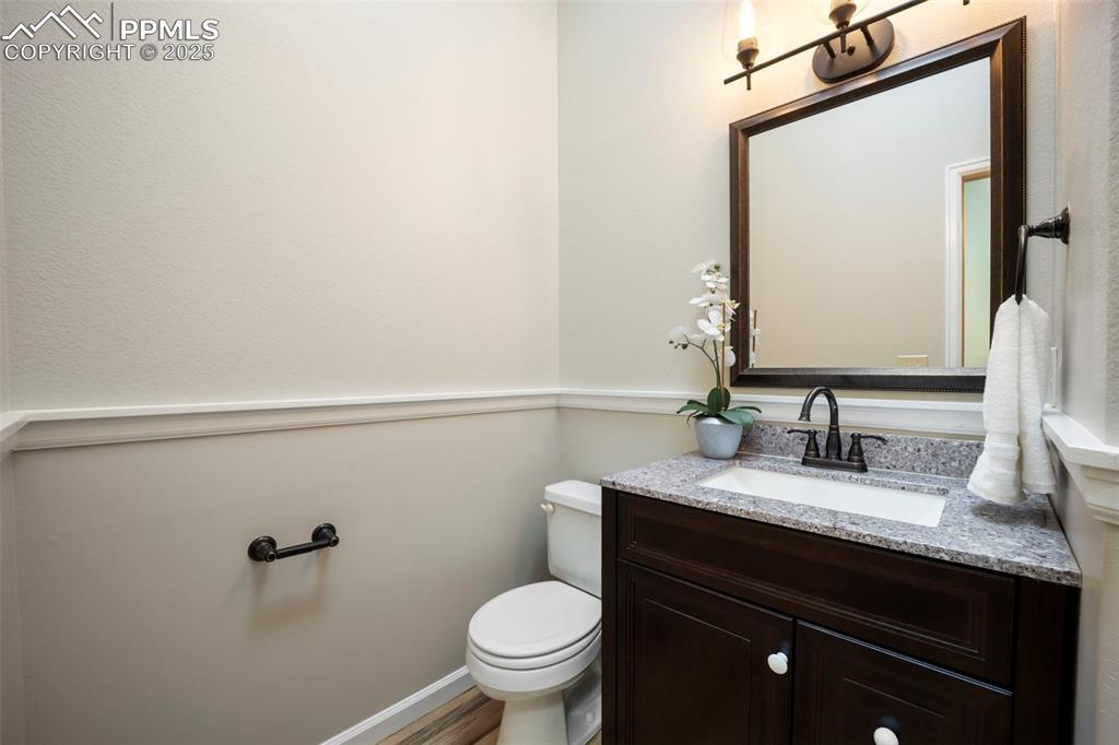 Image 11 of 33: Bathroom featuring vanity and light wood-style floors