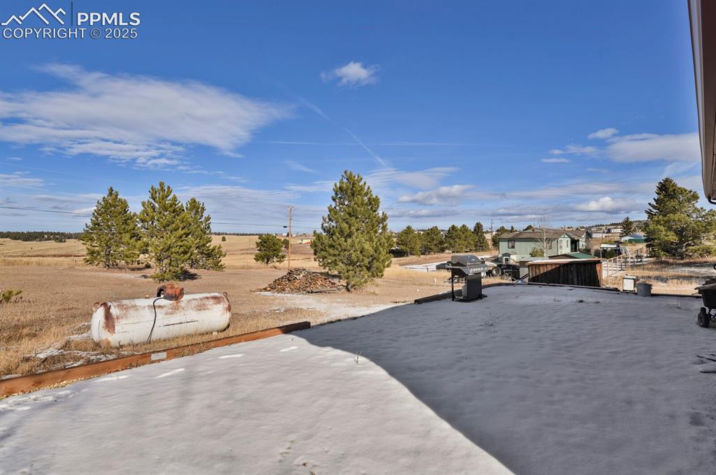 Image 20 of 29: Back yard spans all the way to the new street behind