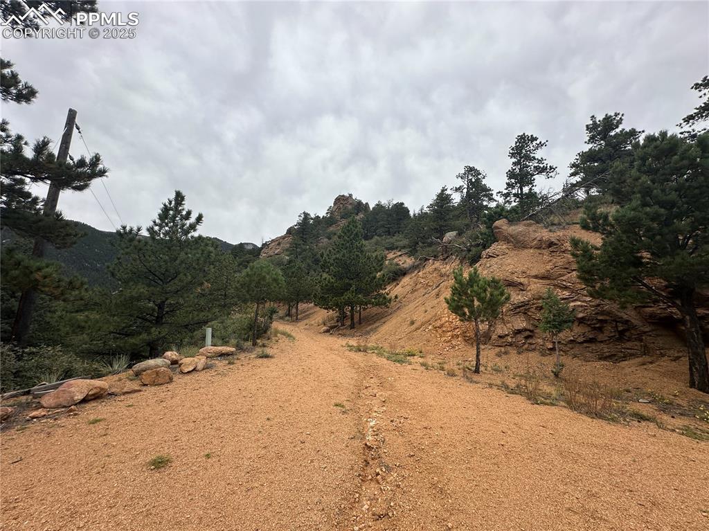 Image 11 of 23: Driveway from the build site with electric brought to the lot line.