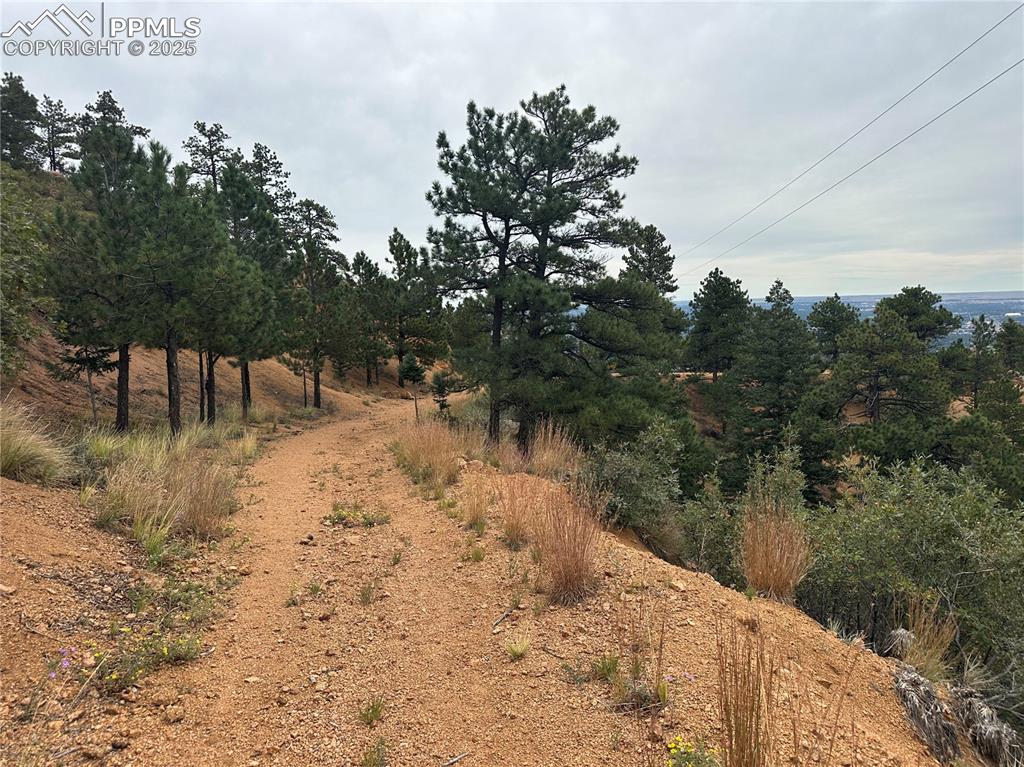 Image 12 of 23: Driveway to lot