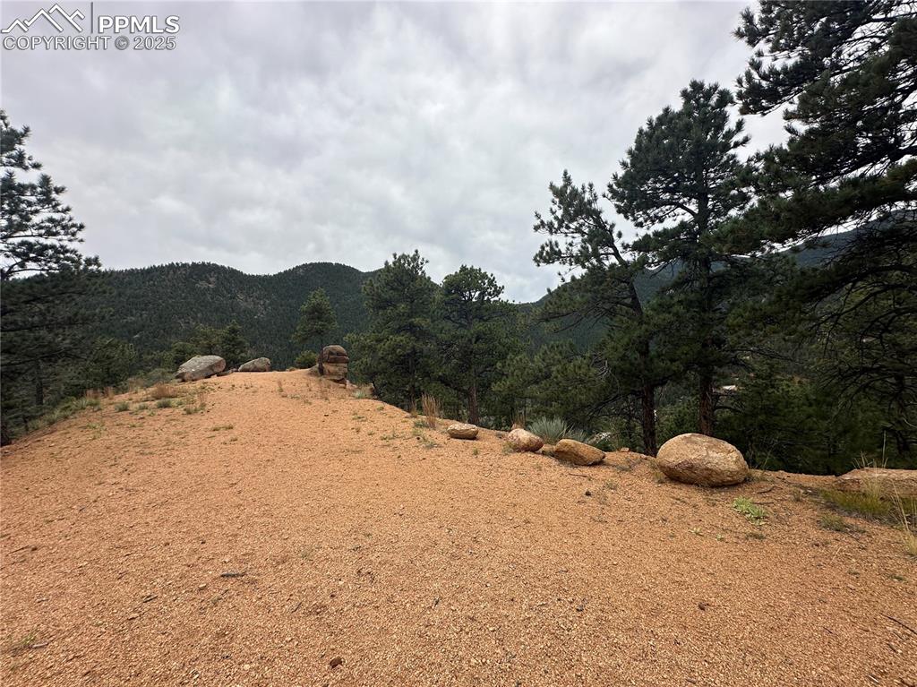 Image 6 of 23: Rock outcroppings near build site