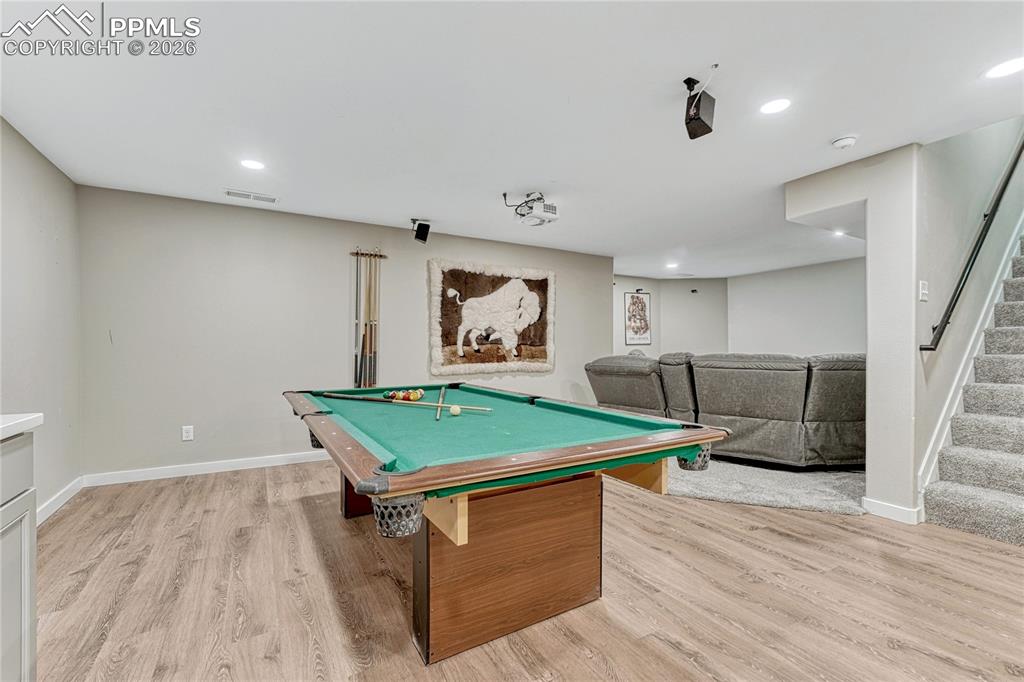 Image 38 of 48: Finished basement is a perfect entertainment hub.