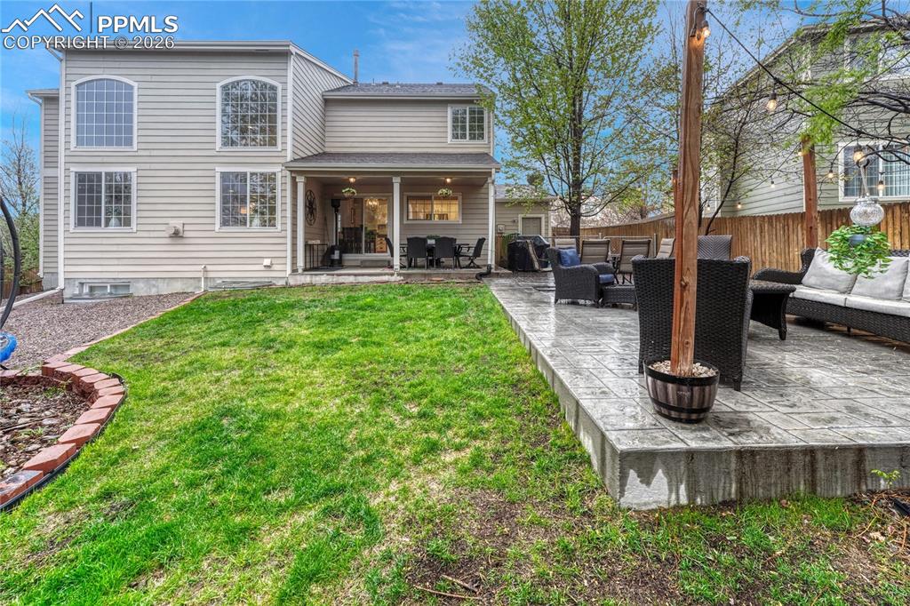 Image 47 of 48: Extended patio for excellent gathering space