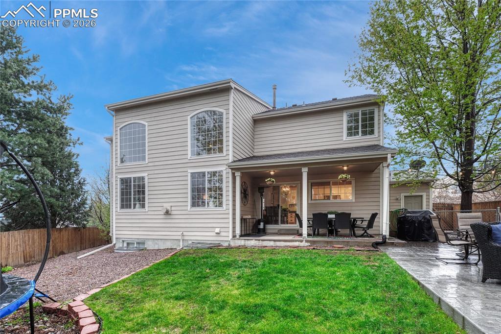 Image 48 of 48: Covered patio, BBQ space, dog run, great backyard.